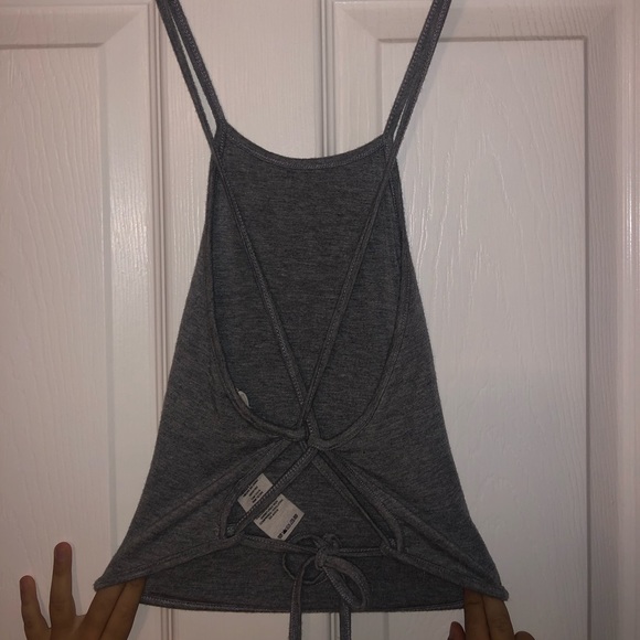 Gray crop top tied in back that cross crosses - Picture 2 of 2